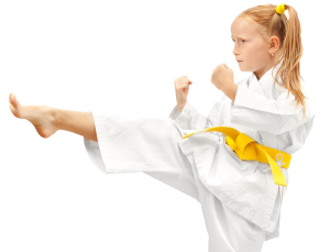 young redhead girl karate kicking